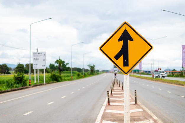 Traffic sign, lanes merging left 