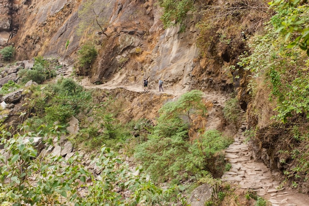 Trail along the steep wall of the gorge in the Himalayas in the Manaslu region. Nepal