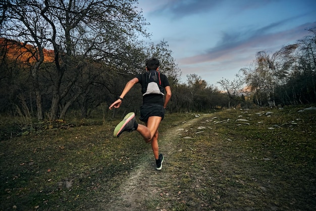 Trail running at sunset