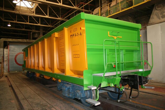 Train freight yellow and green wagon