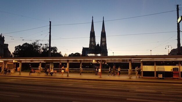 Train on railroad station against clear sky