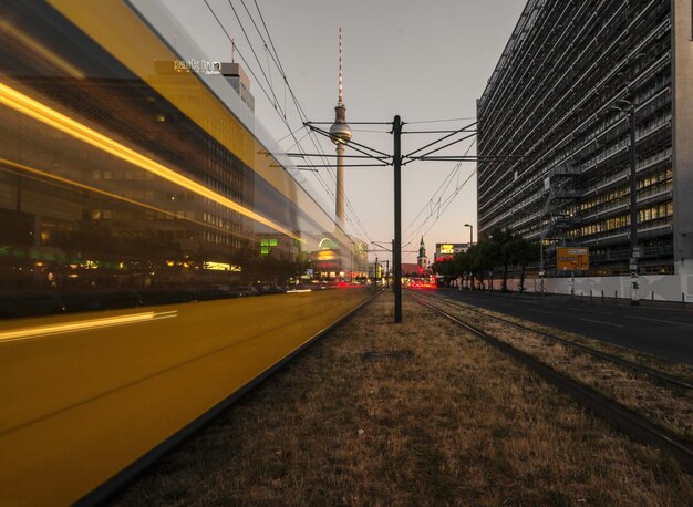 Train at railroad station against sky