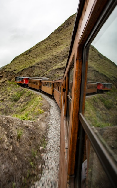 Train on railroad track against sky