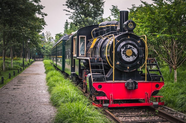 Train on railroad track against sky