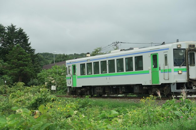 Train on railroad track against sky