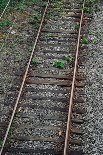 train railroad tracks in the street in the station       