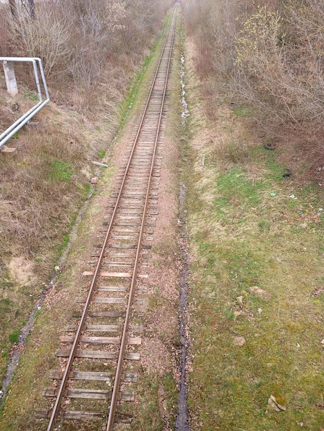 A train track with a sign on it