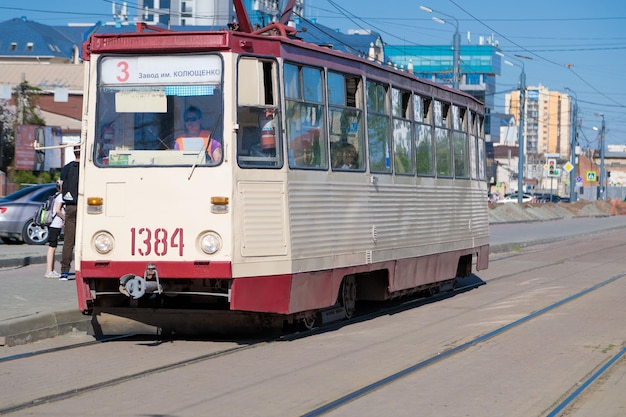 The tram carries people along the route of the city