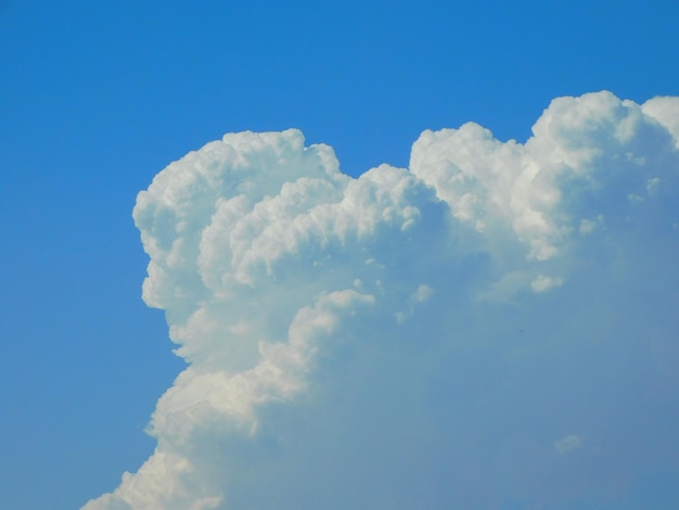 Tranquil cloudscape clear blue sky and fluffy white clouds