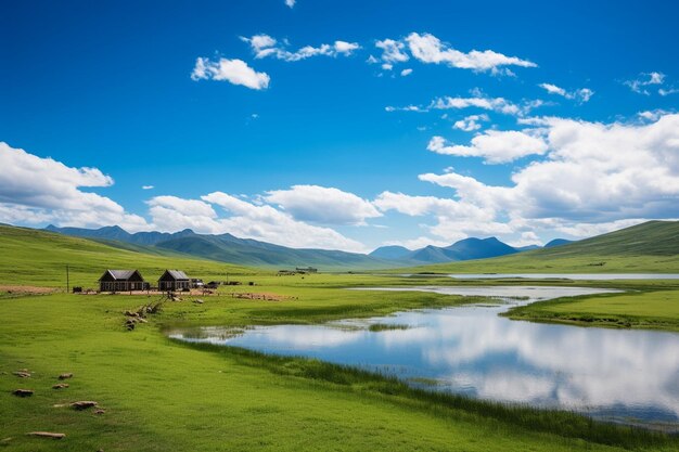 Foto tranquil scene mountain range with grass and water farm cloud sky summer