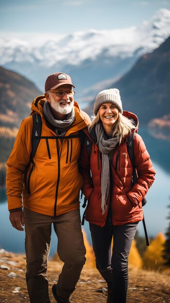 Tranquil trek elderly couple walks admiring the alpine fall landscape