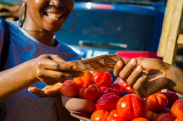 Transaction between a trader and her customer