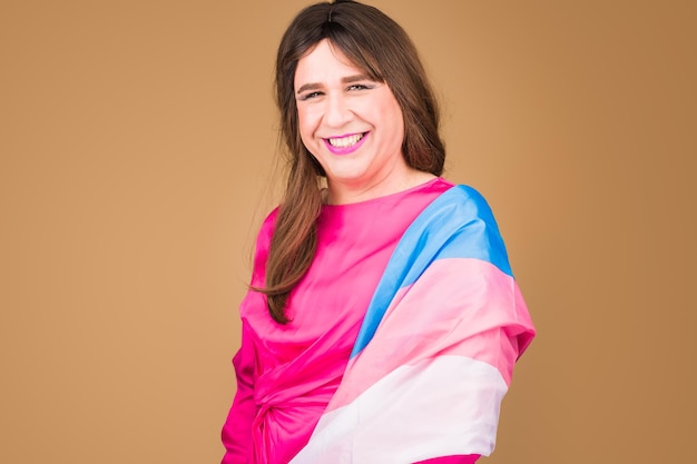 Transgender female woman with flag Hispanic mature portrait lgbtq professional