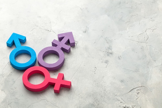 Transgender symbool en geslacht symbool van man en vrouw op een grijze achtergrond.