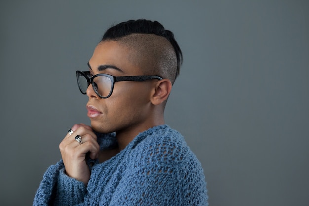 Transgender woman wearing eyeglasses