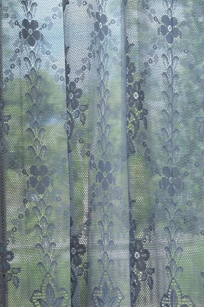 translucent curtain with green nature background