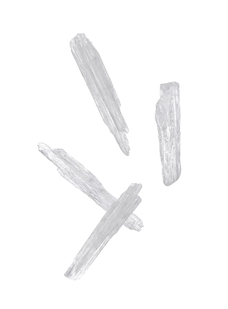 Photo translucent menthol crystals falling on white background