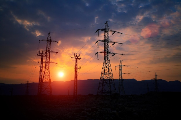 Transmission facilities in Negev desert at sunset Israel
