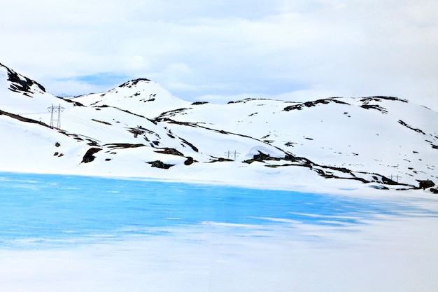 Transmission line located on the edge of a frozen lake