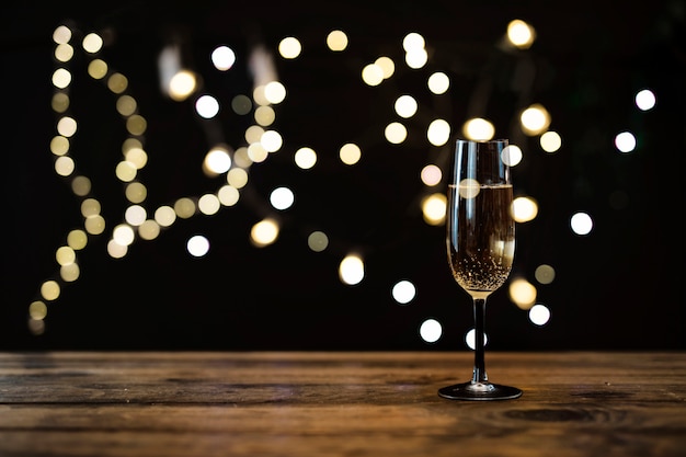 Foto transparant glas champagne met bokeh-effect