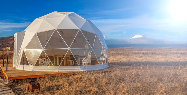 Transparent bell tower pacific ocean glamping luxury travel glamorous camping outdoor lifestyle