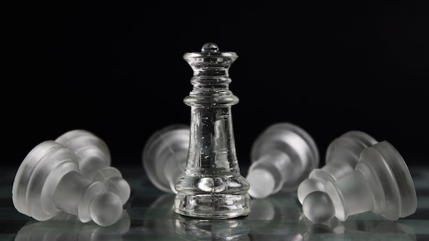 Photo transparent chess pieces on board