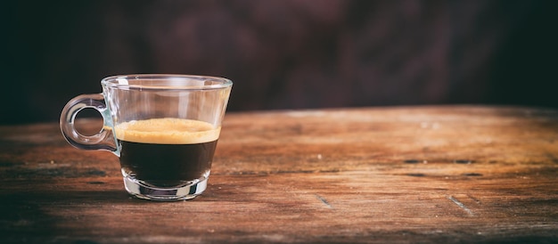 Transparent cup of espresso