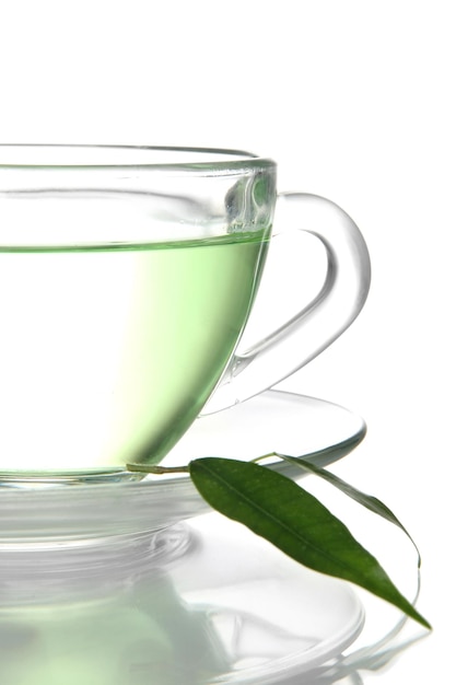 Transparent cup of green tea isolated on white