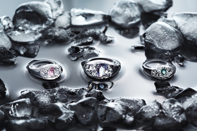 Transparent icy rings made from glass in ice and water