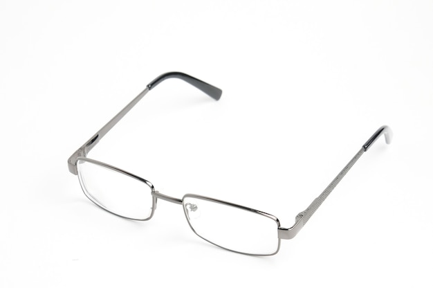 Transparent optical glasses with a eyeglass case on an isolated white.
