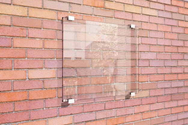 Transparent signboard on red brick wall mock up