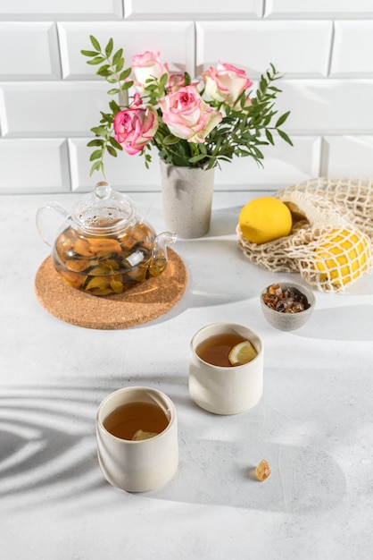 transparent tea pot on a light background