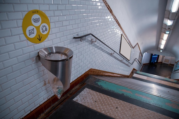 Trash bin view from Paris metro near the stairs