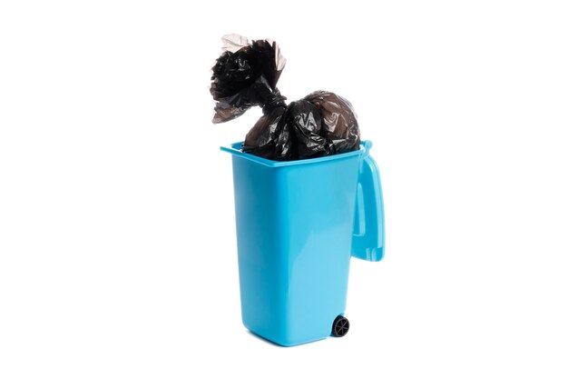 Trash bin with garbage bag isolated on white background