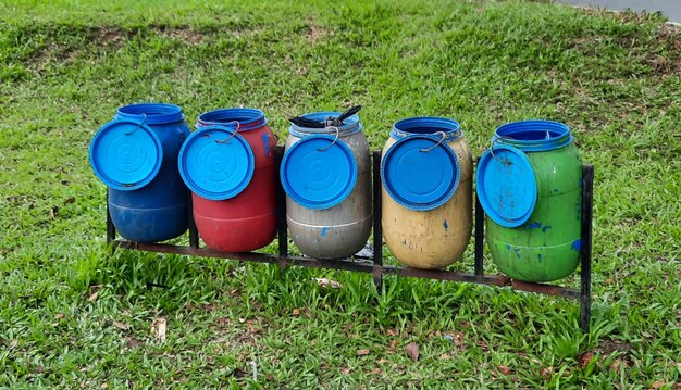 Trash boxes lined up in the park