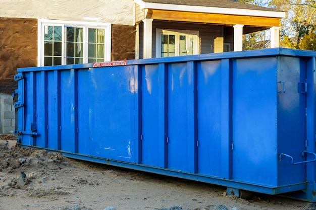 Trash dumpsters a large container filled with industrial garbage bin