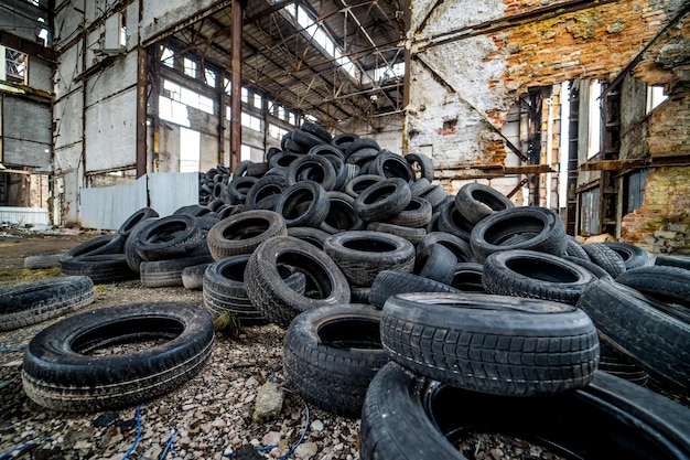 Trash old recycled tires Stack of automobile rubbish