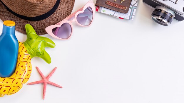 Travel accessories items on white background