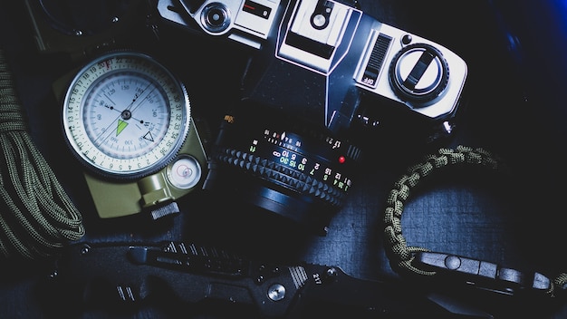 Travel accessories set on black wooden