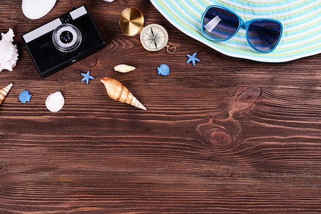 Travel accessories on wooden space