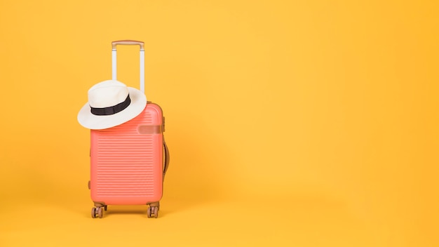 Travel accessories on yellow background