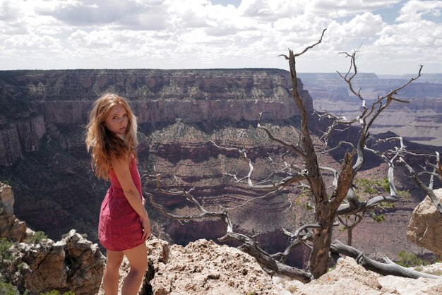 Travel and amazing view adventure concept woman on grand canyon young woman enjoying scenic dramatic