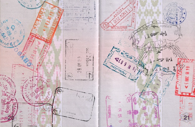 Travel background with different passport stamps