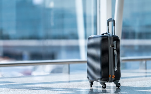 Photo travel bag luggage at airport terminal