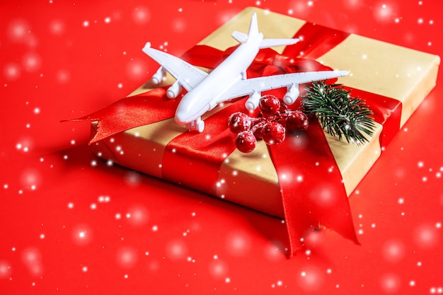 Travel for Christmas. Airplane with Christmas decor.New year.Selective focus.holidays