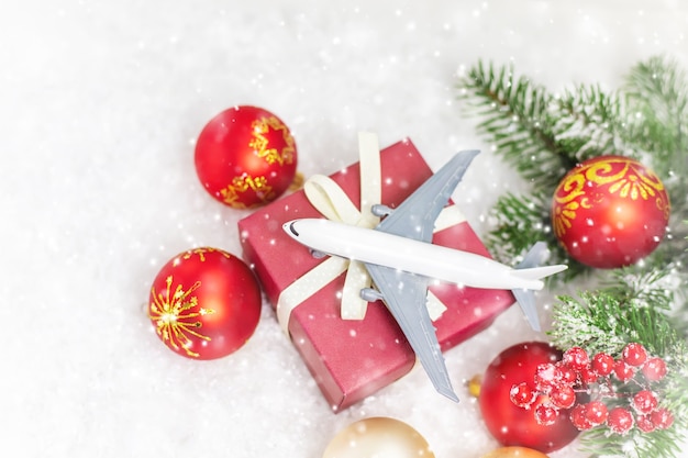 travel for christmas. airplane with christmas decor. selective focus.holiday