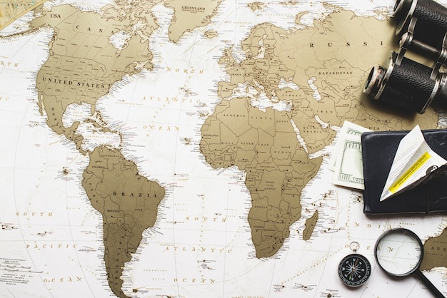 Travel composition with world map and decorative items