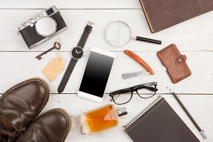Photo travel concept set of cool stuff with camera and other things on wooden table