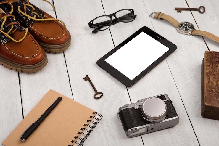Photo travel concept shoes camera tablet pc notepad watch glasses casket and vintage keys
