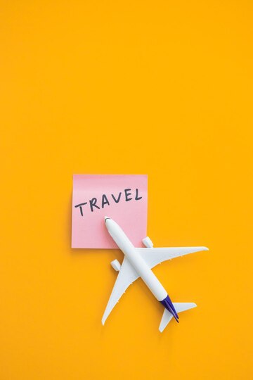 Premium Photo | Travel concept on yellow background with copy space airplane  toy on yellow color background